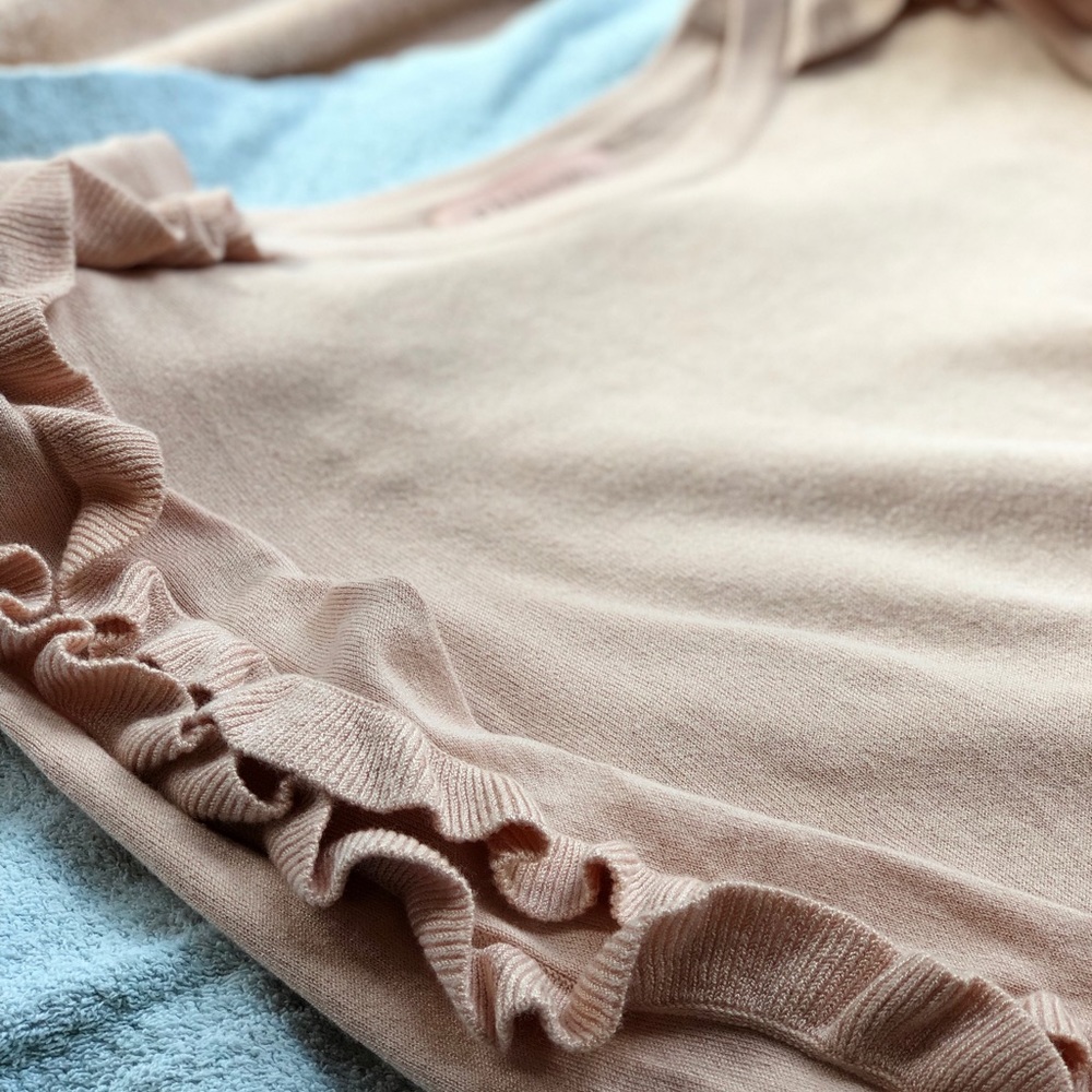 Light pink ruffled shirt